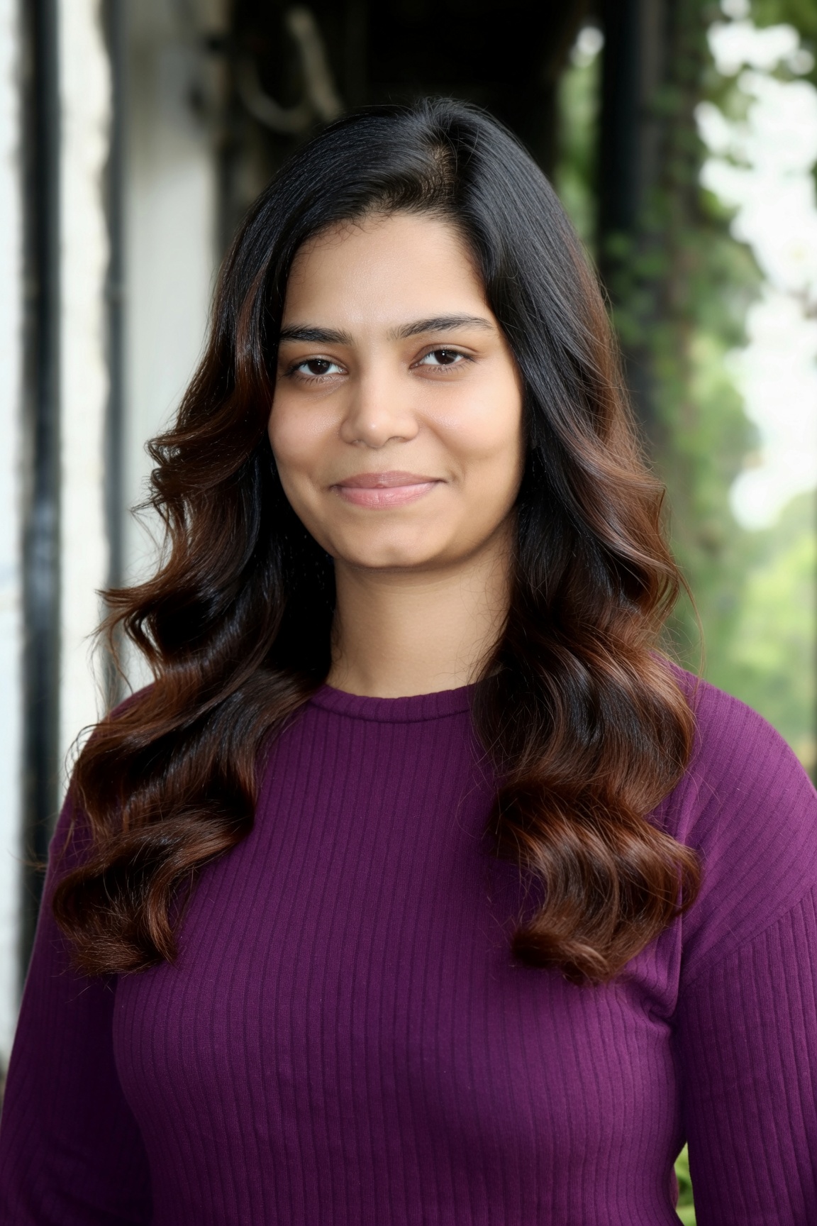 Long, softly layered waves created at Salon Nayana